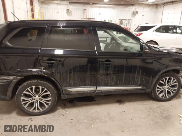 2016 Mitsubishi Outlander SE with VIN JA4AZ3A35GZ037422, listed as a IAAI auction lot 41504909 with 115,242 mi miles and . Bid and sale history available at DreamBid. Image 13.