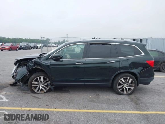 2017 Honda Pilot Touring with VIN 5FNYF6H93HB068846, listed as a IAAI auction lot 42083050 with 108,787 mi miles and . Bid and sale history available at DreamBid. Image 14.