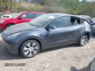 2022 Tesla Model Y Long Range z VIN 7SAYGDEE2NF447998, wystawiony jako IAAI lot #41704968 z przebiegiem 34 088 mil mil oraz . Historia ofert i sprzedaży dostępna na DreamBid. Obrazek 14.