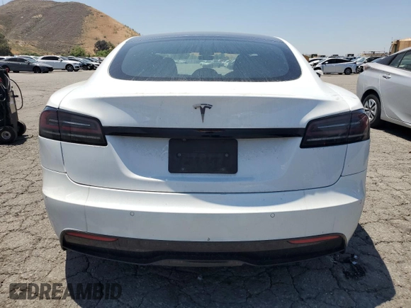 2023 Tesla Model S z VIN 5YJSA1E58PF500032, wystawiony jako Copart lot #57532955 z przebiegiem Nie podano mil oraz Szkoda całkowita • Salvage title. Historia ofert i sprzedaży dostępna na DreamBid. Obrazek 6.