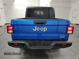 2023 Jeep Gladiator Overland z VIN 1C6HJTFG6PL564337, wystawiony jako Copart lot #59620315 z przebiegiem 31 552 mil mil oraz Czysty tytuł • Clean title. Historia ofert i sprzedaży dostępna na DreamBid. Obrazek 6.