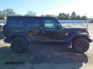 2020 Jeep Wrangler Unlimited Sport S с VIN 1C4HJXDG9LW328034, выставлен на аукционе IAAI как лот 41808054 с пробегом 48 781 миль миль и . История ставок и продаж доступна на DreamBid. Изображение 13.