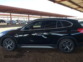 2018 BMW X1 sDrive28i z VIN WBXHU7C35J5L06673, wystawiony jako IAAI lot #42275787 z przebiegiem 61 204 mil mil oraz . Historia ofert i sprzedaży dostępna na DreamBid. Obrazek 14.