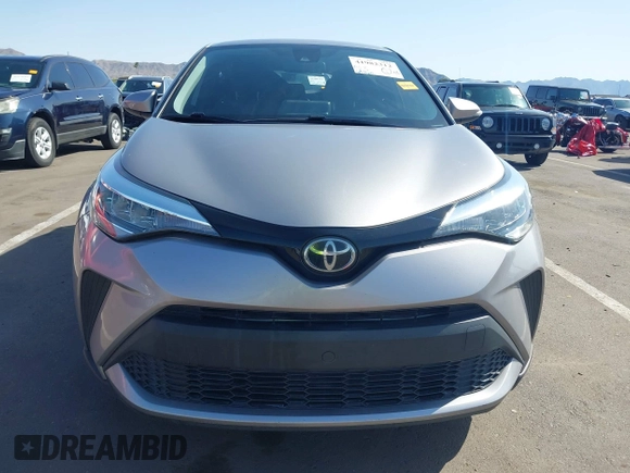 2020 Toyota C-HR LE with VIN JTNKHMBX4L1088502, listed as a IAAI auction lot 41982312 with 69,160 mi miles and . Bid and sale history available at DreamBid. Image 12.