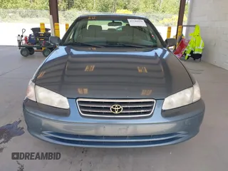 2000 Toyota Camry CE z VIN JT2BG22KXY0406984, wystawiony jako IAAI lot #42344436 z przebiegiem 234 729 mil mil oraz . Historia ofert i sprzedaży dostępna na DreamBid. Obrazek 12.