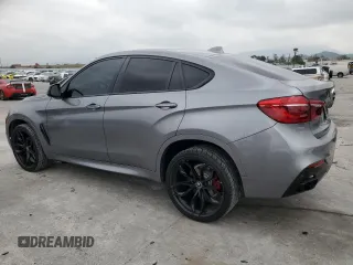 2018 BMW X6 sDrive35i with VIN 5UXKU0C52J0G81057, listed as a Copart auction lot 50698205 with 67,735 mi miles and Salvage Title. Bid and sale history available at carsss.com. Image 2.