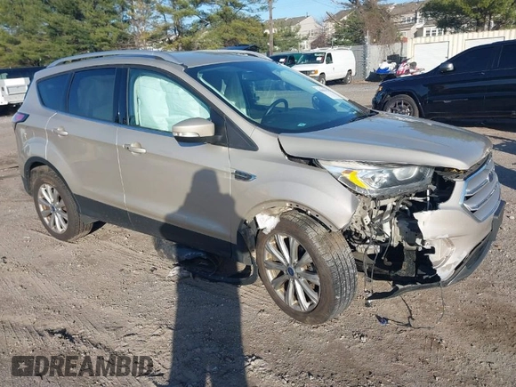 2017 Ford Escape Titanium with VIN 1FMCU0JD2HUD92675, listed as a IAAI auction lot 41834723 with 113,503 mi miles. Bid and sale history available at carsss.com. Image 1.