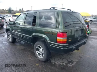 1996 Jeep Grand Cherokee Limited with VIN 1J4GZ78S0TC235692, listed as a IAAI auction lot 41945617 with Not provided miles and . Bid and sale history available at DreamBid. Image 3.