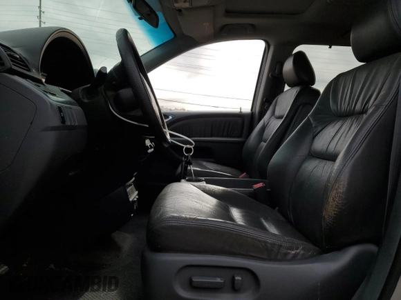 2005 Honda Odyssey EX-L with VIN 5FNRL38715B116530, listed as a Copart auction lot 50807575 with 216,434 mi miles and Salvage Title. Bid and sale history available at DreamBid. Image 7.