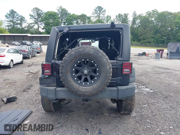 2012 Jeep Wrangler Unlimited Sport with VIN 1C4BJWDG8CL120308, listed as a IAAI auction lot 42365817 with 190,619 mi miles and . Bid and sale history available at DreamBid. Image 17.