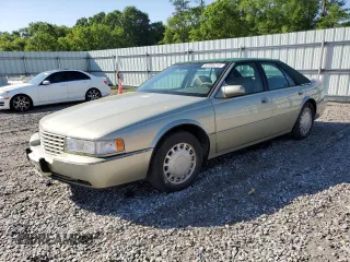 1996 Cadillac Seville Touring STS z VIN 1G6KY5293TU836766, wystawiony jako Copart lot #52395215 z przebiegiem 197 340 mil mil oraz Szkoda całkowita • Salvage title. Historia ofert i sprzedaży dostępna na DreamBid. Obrazek 1.