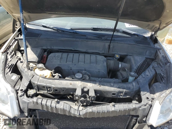 2012 Chevrolet Traverse LTZ z VIN 1GNKVLEDXCJ157466, wystawiony jako Copart lot #56336585 z przebiegiem 207 105 mil mil oraz Szkoda całkowita • Salvage title. Historia ofert i sprzedaży dostępna na DreamBid. Obrazek 12.
