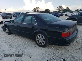 2001 Cadillac Seville Touring STS z VIN 1G6KY549X1U282930, wystawiony jako Copart lot #72750504 z przebiegiem Nie podano mil oraz Szkoda całkowita • Salvage title. Historia ofert i sprzedaży dostępna na DreamBid. Obrazek 2.
