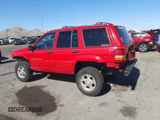 1996 Jeep Grand Cherokee Limited with VIN 1J4GZ78Y0TC376265, listed as a Copart auction lot 52124345 with 205,676 mi miles and Salvage Title. Bid and sale history available at carsss.com. Image 2.