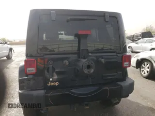 2014 Jeep Wrangler Unlimited Sahara with VIN 1C4BJWEG6EL185501, listed as a Copart auction lot 51538065 with 102,866 mi miles and Salvage Title. Bid and sale history available at carsss.com. Image 6.