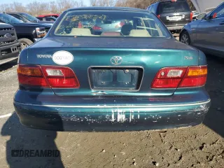 1998 Toyota Avalon XL with VIN 4T1BF18B5WU281065, listed as a Copart auction lot 49978705 with Not Provided miles and Salvage Title. Bid and sale history available at DreamBid. Image 6.