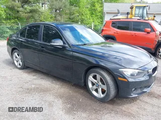 2013 BMW 3 Series 328i xDrive with VIN WBA3B3C59DF543640, listed as a IAAI auction lot 42208779 with 183,737 mi miles and . Bid and sale history available at DreamBid. Image 1.
