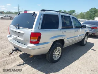 2002 Jeep Grand Cherokee Limited with VIN 1J8GW58S62C253818, listed as a IAAI auction lot 41983592 with 165,378 mi miles. Bid and sale history available at carsss.com. Image 4.