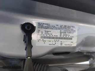 2013 Ford C-Max Energi SEL with VIN 1FADP5CU6DL515510, listed as a IAAI auction lot 41180709 with 166,508 mi miles. Bid and sale history available at carsss.com. Image 9.