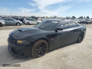 2018 Dodge Charger R/T Scat Pack with VIN 2C3CDXGJ1JH163606, listed as a Copart auction lot 79697084 with 119,526 mi miles and Salvage Title. Bid and sale history available at carsss.com. Image 1.