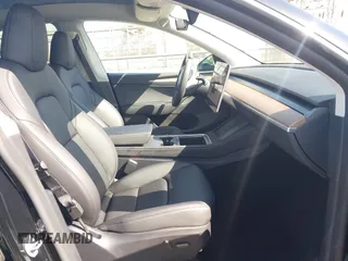 2025 Tesla Model Y Long Range with VIN 7SAYGDEE9SF278607, listed as a IAAI auction lot 41932084 with 9,667 mi miles and . Bid and sale history available at carsss.com. Image 5.