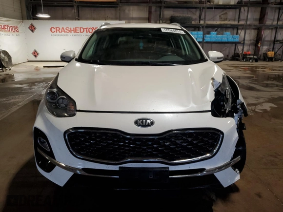 2020 Kia Sportage EX z VIN KNDPNCAC6L7804485, wystawiony jako Copart lot #56988855 z przebiegiem 117 112 mil mil oraz Szkoda całkowita • Salvage title. Historia ofert i sprzedaży dostępna na DreamBid. Obrazek 5.