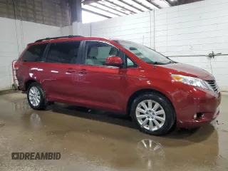 2014 Toyota Sienna LE with VIN 5TDJK3DC9ES083307, listed as a Copart auction lot 57939385 with 132,494 mi miles and Salvage title. Bid and sale history available at DreamBid. Image 4.