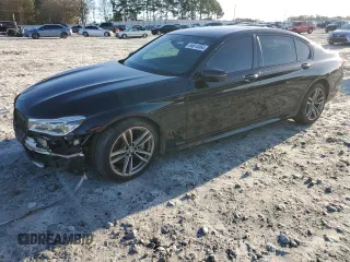 2016 BMW 7 Series 750i with VIN WBA7F0C5XGGL99048, listed as a Copart auction lot 84815364 with 96,743 mi miles and Salvage Title. Bid and sale history available at carsss.com. Image 1.