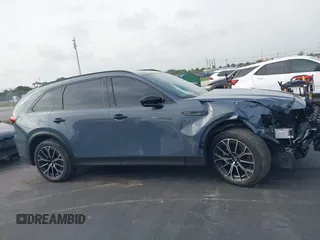 2025 Mazda CX-70 Premium Plus with VIN JM3KJEHA3S1126454, listed as a IAAI auction lot 42427454 with 5,648 mi miles and . Bid and sale history available at DreamBid. Image 13.