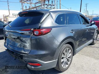2017 Mazda CX-9 Signature z VIN JM3TCBEY2H0131030, wystawiony jako IAAI lot #41644367 z przebiegiem 193 231 mil mil oraz . Historia ofert i sprzedaży dostępna na DreamBid. Obrazek 4.