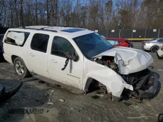 2013 Chevrolet Suburban LT with VIN 1GNSKJE74DR239851, listed as a Copart auction lot 44856425 with 203,074 mi miles and Salvage Title. Bid and sale history available at DreamBid. Image 4.