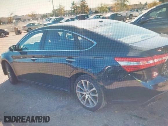 2014 Toyota Avalon Limited with VIN 4T1BK1EB4EU096164, listed as a IAAI auction lot 40904808 with 242,086 mi miles. Bid and sale history available at carsss.com. Image 13.