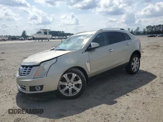2015 Cadillac SRX Performance Collection z VIN 3GYFNCE39FS611396, wystawiony jako Copart lot #54777095 z przebiegiem 74 282 mil mil oraz Szkody całkowita. Historia ofert i sprzedaży dostępna na DreamBid. Obrazek 1.