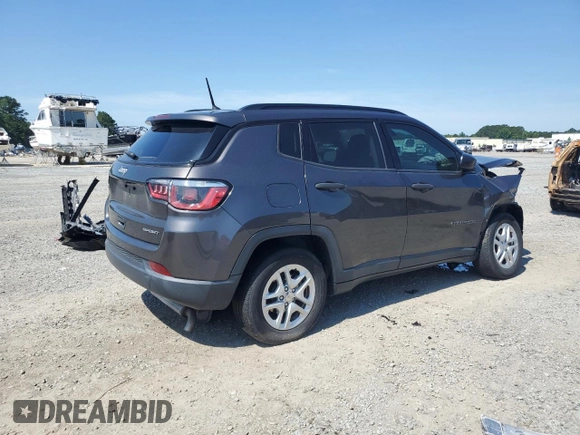 2018 Jeep Compass Sport with VIN 3C4NJCABXJT105430, listed as a Copart auction lot 59237575 with 104,600 mi miles and Salvage title. Bid and sale history available at DreamBid. Image 3.