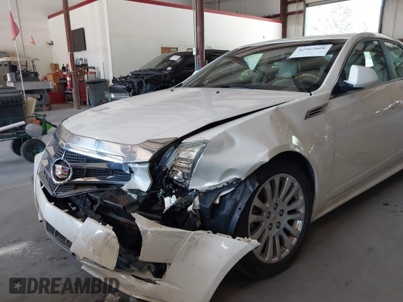 2010 Cadillac CTS Premium with VIN 1G6DS5EV8A0142811, listed as a IAAI auction lot 42562666 with 177,963 mi miles and . Bid and sale history available at DreamBid. Image 6.