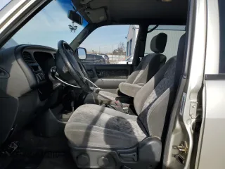 2001 Isuzu Trooper S with VIN JACDJ58X117J11550, listed as a Copart auction lot 46323185 with 236,762 mi miles and Salvage title. Bid and sale history available at DreamBid. Image 7.