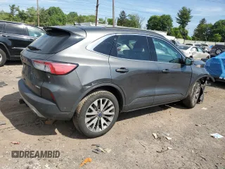 2020 Ford Escape Titanium с VIN 1FMCU9J99LUC63261, выставлен на аукционе Copart как лот 56312955 с пробегом Не указан миль и Списание • Salvage title. История ставок и продаж доступна на DreamBid. Изображение 3.