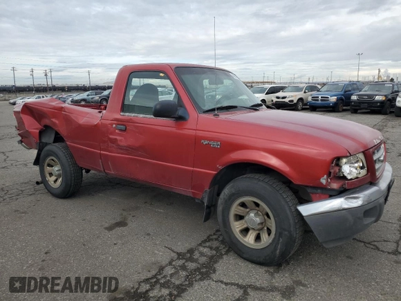 2001 Ford Ranger XL with VIN 1FTYR10C61TA40124, listed as a Copart auction lot 48943325 with 196,810 mi miles and Salvage title. Bid and sale history available at DreamBid. Image 4.