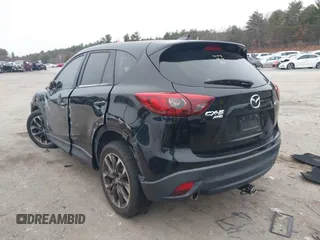 2016 Mazda CX-5 Grand Touring with VIN JM3KE4DY1G0685449, listed as a IAAI auction lot 41162840 with 134,525 mi miles. Bid and sale history available at carsss.com. Image 3.