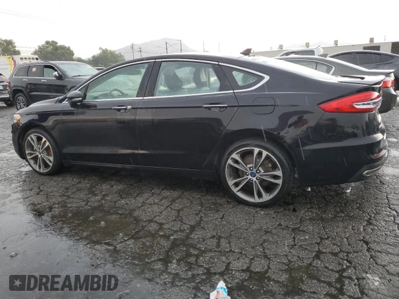 2020 Ford Fusion Titanium with VIN 3FA6P0D94LR153375, listed as a Copart auction lot 59609415 with 104,292 mi miles and Clean title. Bid and sale history available at DreamBid. Image 2.