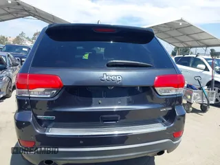 2014 Jeep Grand Cherokee Limited with VIN 1C4RJEBM4EC410243, listed as a IAAI auction lot 42013788 with 177,218 mi miles. Bid and sale history available at carsss.com. Image 16.