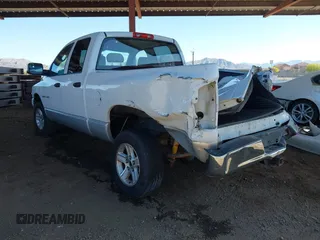 2006 Dodge 1500 SLT with VIN 1D7HU18N56S525572, listed as a IAAI auction lot 42106810 with 174,868 mi miles. Bid and sale history available at carsss.com. Image 3.