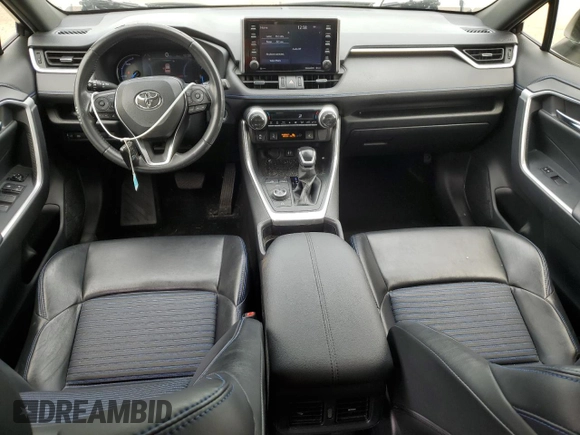 2019 Toyota RAV4 Hybrid XSE with VIN JTMEWRFV4KJ004433, listed as a Copart auction lot 58400445 with 101,108 mi miles and Salvage title. Bid and sale history available at DreamBid. Image 8.