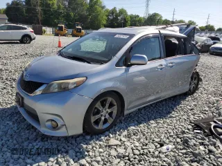 2011 Toyota Sienna SE with VIN 5TDXK3DC2BS099631, listed as a Copart auction lot 54827425 with 231,211 mi miles and Salvage title. Bid and sale history available at DreamBid. Image 1.