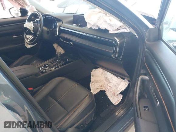 2023 Mazda CX-50 Premium Plus with VIN 7MMVABEY8PN100311, listed as a IAAI auction lot 42626276 with 40,242 mi miles and . Bid and sale history available at DreamBid. Image 5.