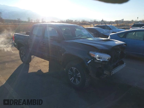 2016 Toyota Tacoma SR with VIN 3TMCZ5AN0GM023263, listed as a IAAI auction lot 41302069 with 137,276 mi miles and . Bid and sale history available at DreamBid. Image 1.