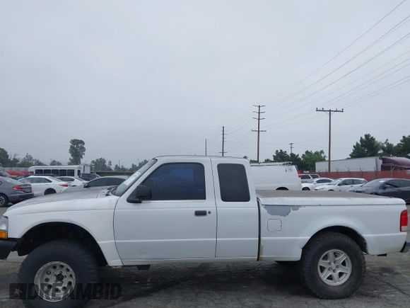 2000 Ford Ranger XLT with VIN 1FTZR15XXYPB55957, listed as a IAAI auction lot 42431758 with 349,550 mi miles and . Bid and sale history available at DreamBid. Image 14.
