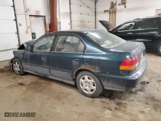 1998 Honda Civic EX with VIN 1HGEJ8644WL048394, listed as a Copart auction lot 83561754 with 221,584 mi miles and Salvage Title. Bid and sale history available at carsss.com. Image 2.
