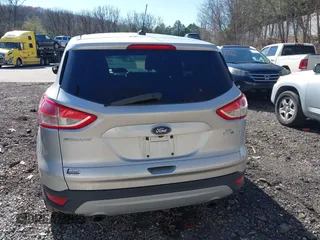 2014 Ford Escape SE with VIN 1FMCU9GX5EUD36442, listed as a IAAI auction lot 41984241 with 105,423 mi miles. Bid and sale history available at carsss.com. Image 16.