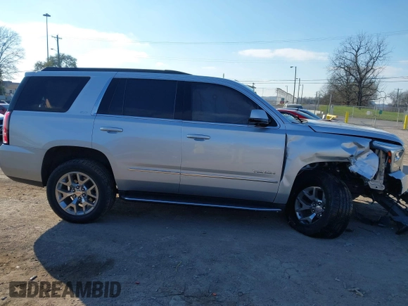 2020 GMC Yukon SLT Standard Edition with VIN 1GKS2DKCXLR294027, listed as a IAAI auction lot 41004965 with 69,161 mi miles. Bid and sale history available at carsss.com. Image 13.
